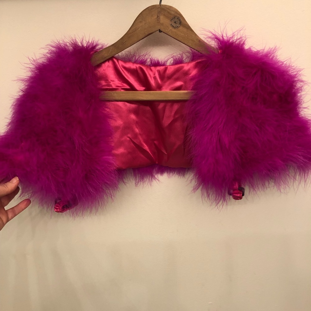 Feather pink accessory to wear over sleeveless dress to dress it up